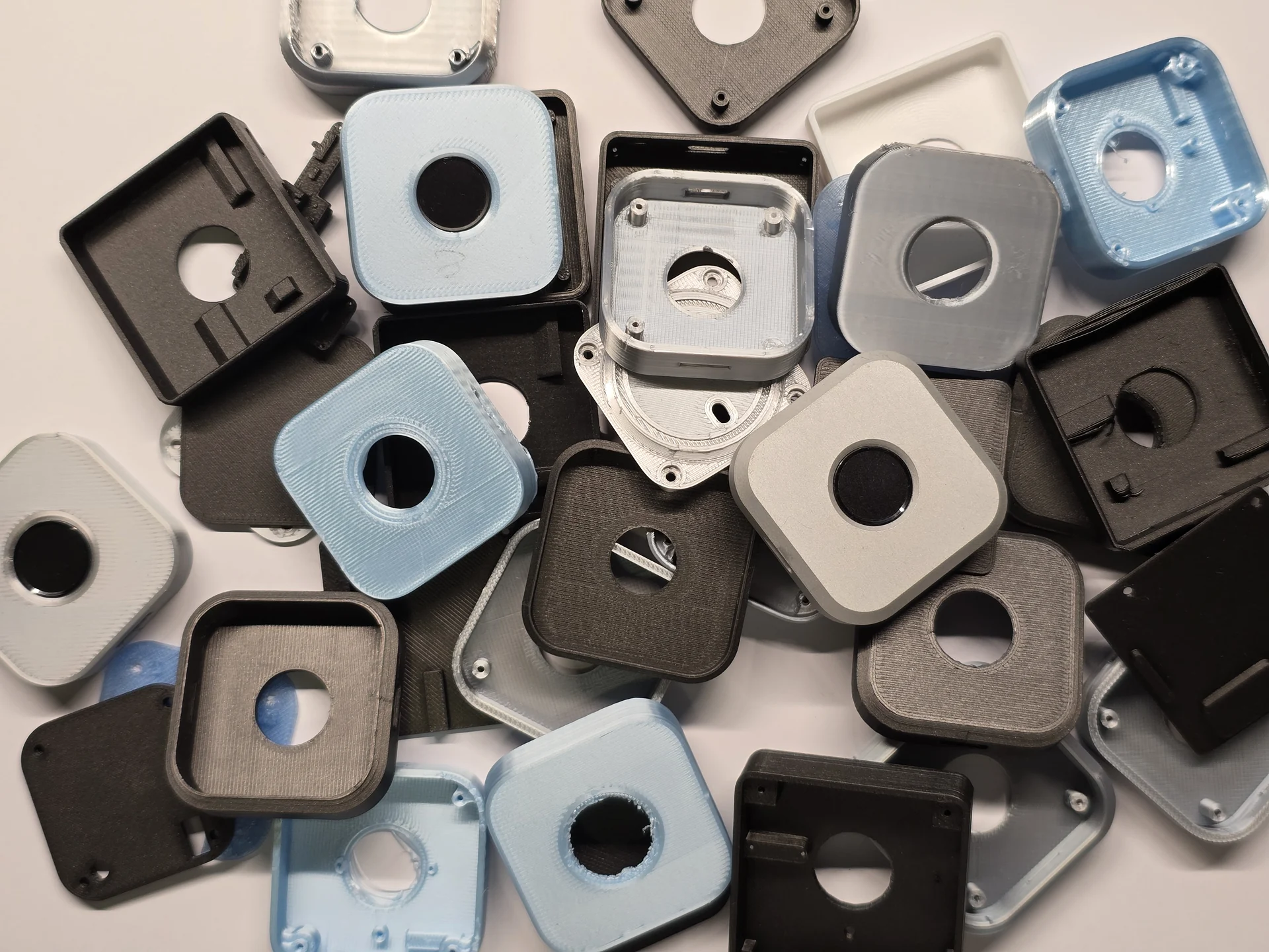 A pile of failed 3D-printed enclosure prototypes for immurok